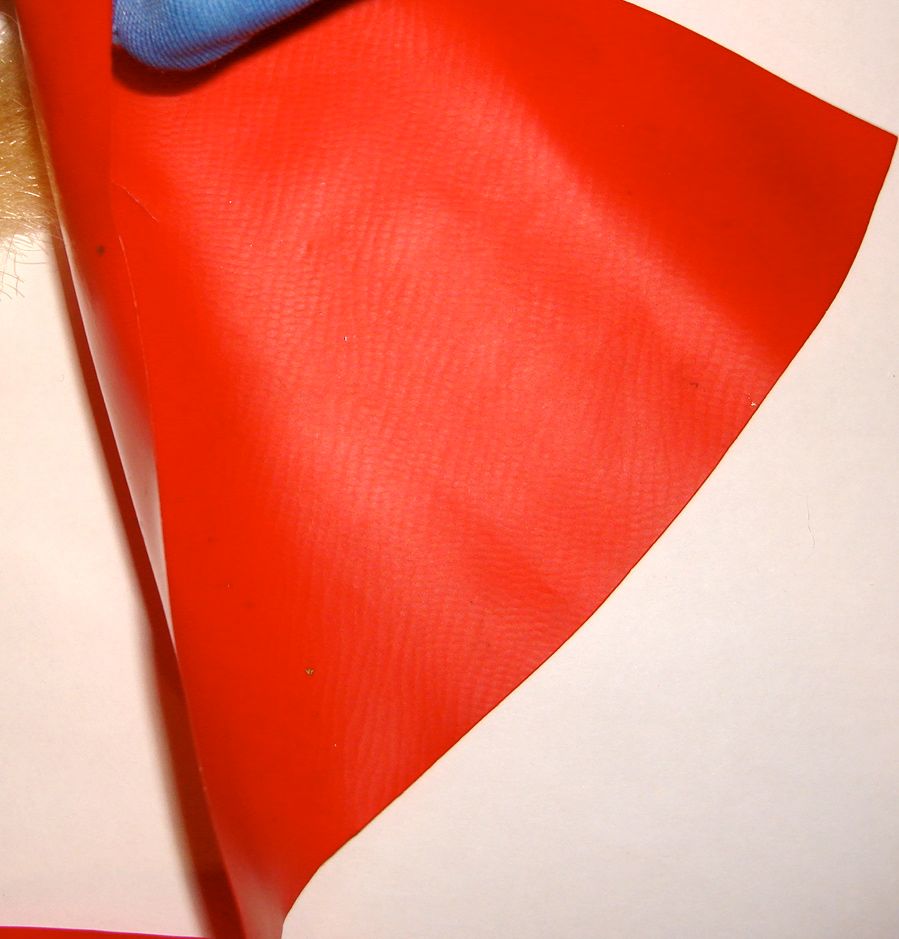 Ledy original cape, notice smooth outside of cape (left side), and striations on inside of cape